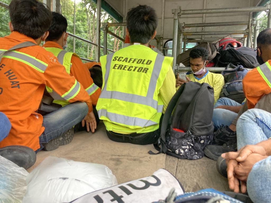 In July 2022, I became a construction worker for a day, to better understand what it was like for them, carrying poles, standing under the hot sun, and sleeping with others. 